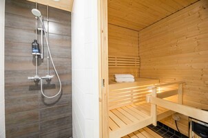 Deluxe Apartment, 2 Bedrooms, Sauna, City View | Bathroom | Shower, hair dryer, bathrobes, bidet