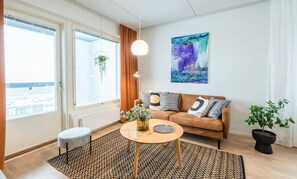 Appartamento Superior, sauna, vista lago parziale | Area soggiorno