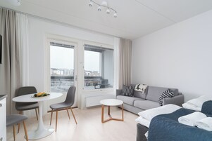 Apartamento Deluxe, balcón, vistas a la ciudad | Zona de estar