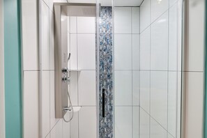 Shower, hair dryer, towels, soap