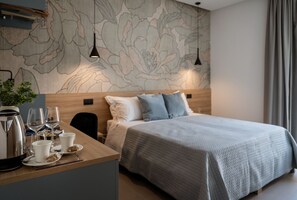 デラックス ダブルまたはツインルーム | 羽毛の掛け布団、ミニバーのアイテム (無料)、セーフティボックス (室内)、客室ごとに異なる装飾