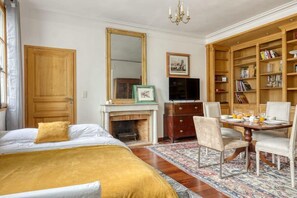 1 bedroom, desk, iron/ironing board, travel crib