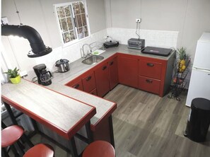 Microwave, coffee/tea maker, electric kettle, cookware/dishes/utensils