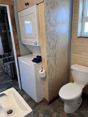Shower, towels, soap, toilet paper