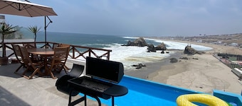 Beachfront house over El Chanque hill with pool, barbecue area and amazing view