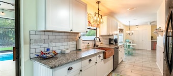 🍹🌞 Coastal Getaway! Heated Pool, Private Patio, Fenced Yard, 5 miles to Beach!