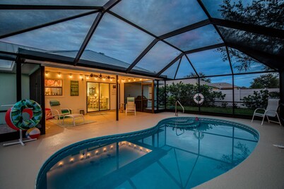 Coastal Getaway! Heated Pool, Private Patio, Fenced Yard, 5 miles to Beach!