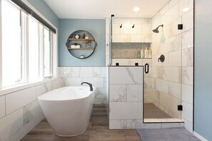 Combined shower/tub, hair dryer, towels, soap