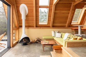 Fireplace, stereo - Shackup A-frame— Private Hot Tub & Beach Access (La Have)