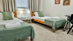 3 bedrooms, desk, iron/ironing board, travel cot