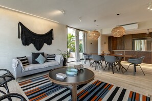 Deluxe Apartment, 3 Bedrooms | Living area | 50-inch Smart TV with digital channels, TV - Casa Libre (Tulum)