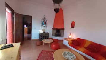 TV, fireplace, books, stereo