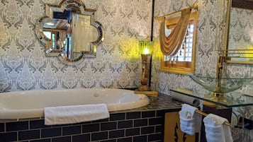 Bathtub, jetted tub, hair dryer, towels