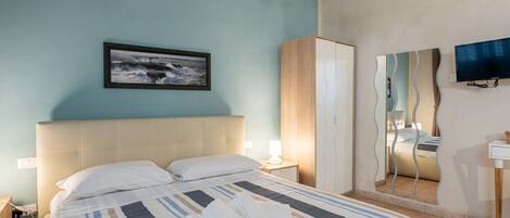 Desk, iron/ironing board, internet, bed sheets