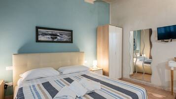 Desk, iron/ironing board, internet, bed sheets