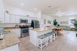 Fridge, coffee/tea maker, blender, dining tables