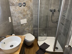 Chuveiro, secador de cabelo