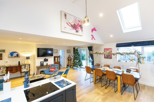 Large open plan kitchen, lounge, dining.