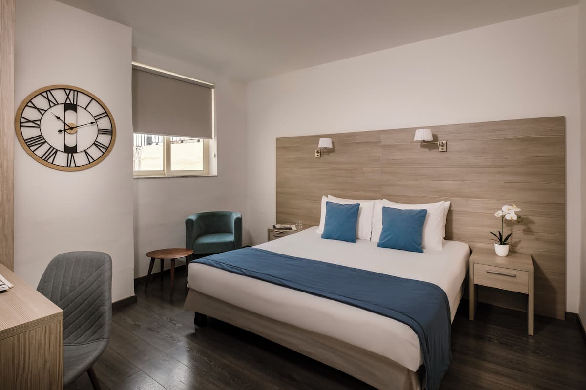 Desk, laptop workspace, free WiFi, bed sheets