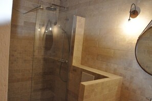 Shower, hair dryer, towels, toilet paper