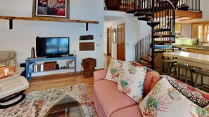 Smart TV, fireplace, books