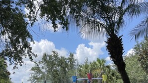 A water play area with multiple water jets and colorful structures. - Spacious 1st floor in Bahama Bay, Resort Amenities. Disney, less than 15 mins (Davenport)