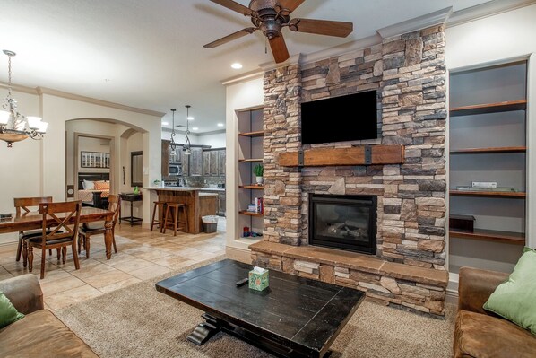 Smart TV, fireplace, books