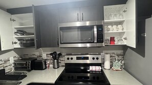 Microwave, toaster, dining tables - Fully Separate and Private 1Bed 1Bath Guest Legal Suite (Edmonton)