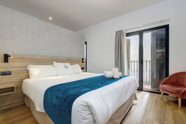 Familie appartement, 1 slaapkamer | Een strijkplank/strijkijzer, gratis wifi, beddengoed