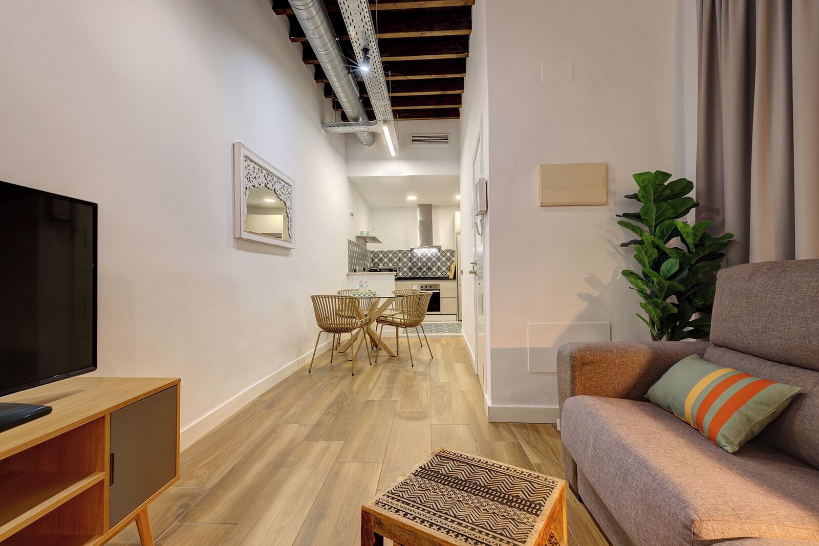 Family Apartment, 1 Bedroom | Living area | 30-inch LCD TV with cable channels