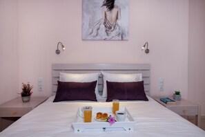2 habitaciones, tabla de planchar con plancha y cuna de viaje 