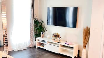 Smart TV, fireplace, table tennis, books