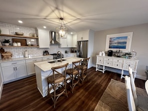 Fridge, microwave, oven, stovetop - Brand new loft overlooking Crystal Lake with rooftop deck, steps from the beach! (Beulah)