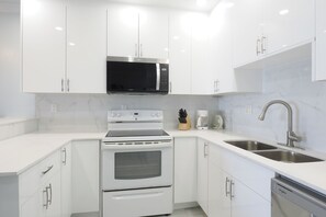 Fridge, microwave, oven, stovetop - Ocean Views from Moon Bay Condos in Bodden Town (Bodden Town)