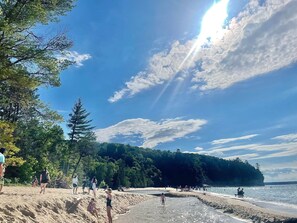 Guests can walk along the beach, surrounded by trees and the sound of the ocean.