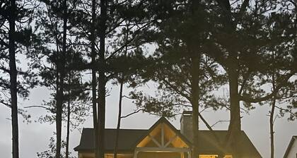 Large 5BR home on quiet cove. Pets welcome. Private dock. 3 fireplaces, firepit.