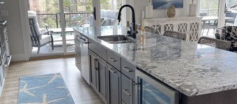 Large 5BR home on quiet cove. Pets welcome. Private dock. 3 fireplaces, firepit.