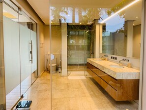 Bathtub, hair dryer, towels