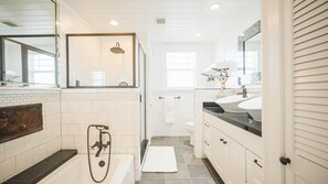 Combined shower/tub, hair dryer, towels, soap