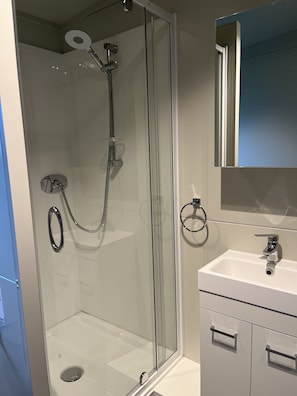Hair dryer, towels, soap, shampoo
