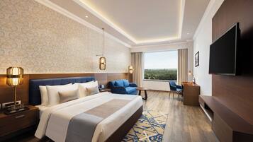 Habitación Deluxe, 1 cama de matrimonio grande | Sábanas de algodón egipcio, ropa de cama de alta calidad, minibar