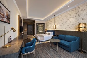 Habitación Premium (Premium King Room) | Sábanas de algodón egipcio, ropa de cama de alta calidad y minibar