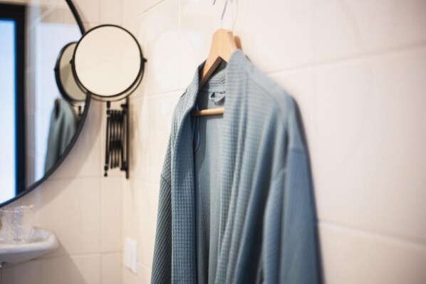 Quarto real | Banheiro | Secador de cabelo, toalhas de banho, sabonete, shampoo