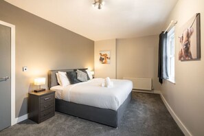 4 bedrooms, desk, iron/ironing board, travel cot