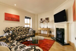 TV, fireplace - Castle Hume 14 · Escape Ordinary at Castle Hume ~ 4 bed ~ Spacious (Castle Hume/Lough Erne)