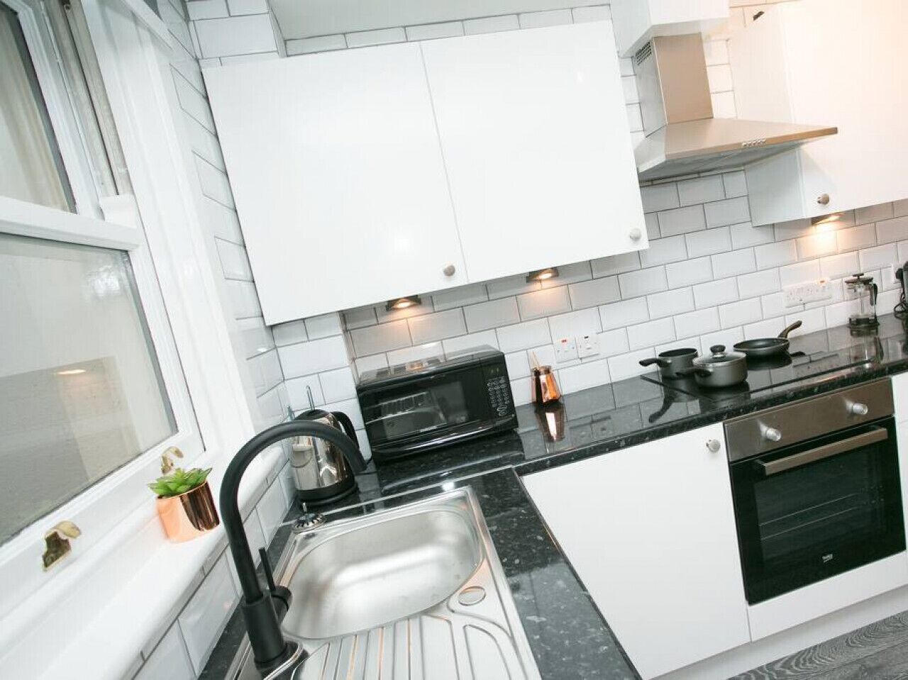 Coffee/tea maker, fridge, microwave, oven