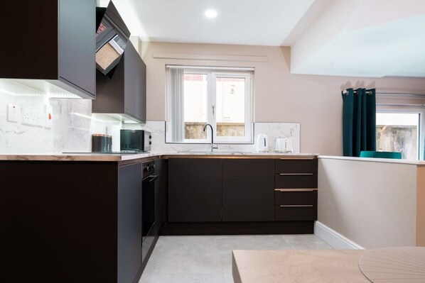 Fridge, microwave, oven, dishwasher