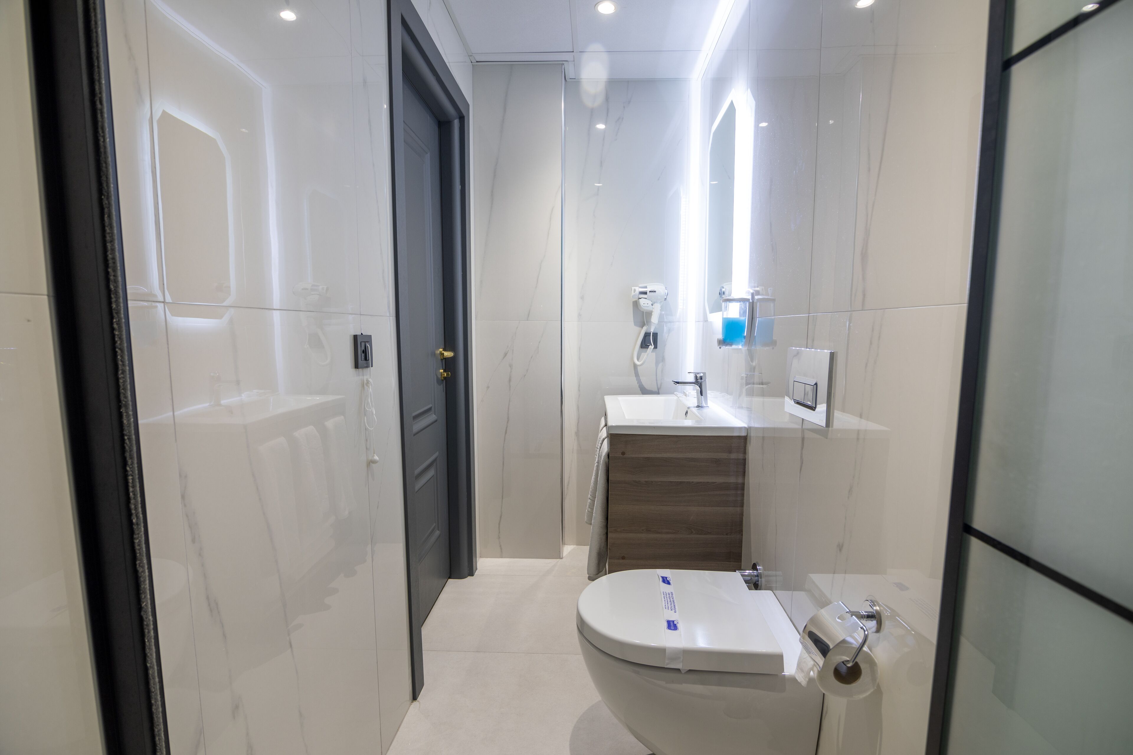 Shower, free toiletries, hair dryer, slippers