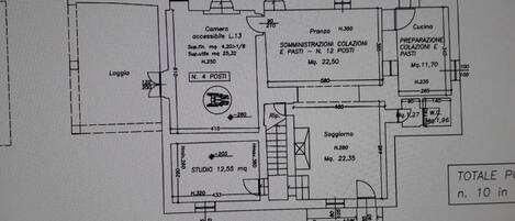 A floor plan of a hotel with labeled rooms and amenities, including a piano terreno, accessible bathroom, and a studio.