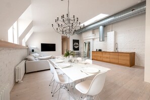 Luxury Apartment | Living area | 40-inch flat-screen TV with cable channels, TV - 2ndhomes Luminous 2BR Loft House w Sauna (Helsinki)